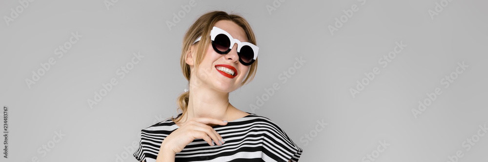 Fototapeta premium Woman in fashionable clothes and sunglasses