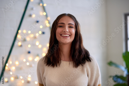 Happy holidays festive celebration woman at home