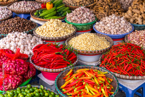 Photography Fresh vegetables and fruits in traditional street market in Hanoi, Vietnam