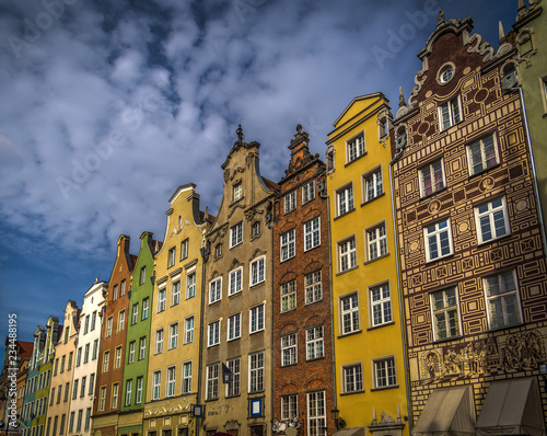 Colorful houses on Long street in Gdansk, Poland with dramatic sky
