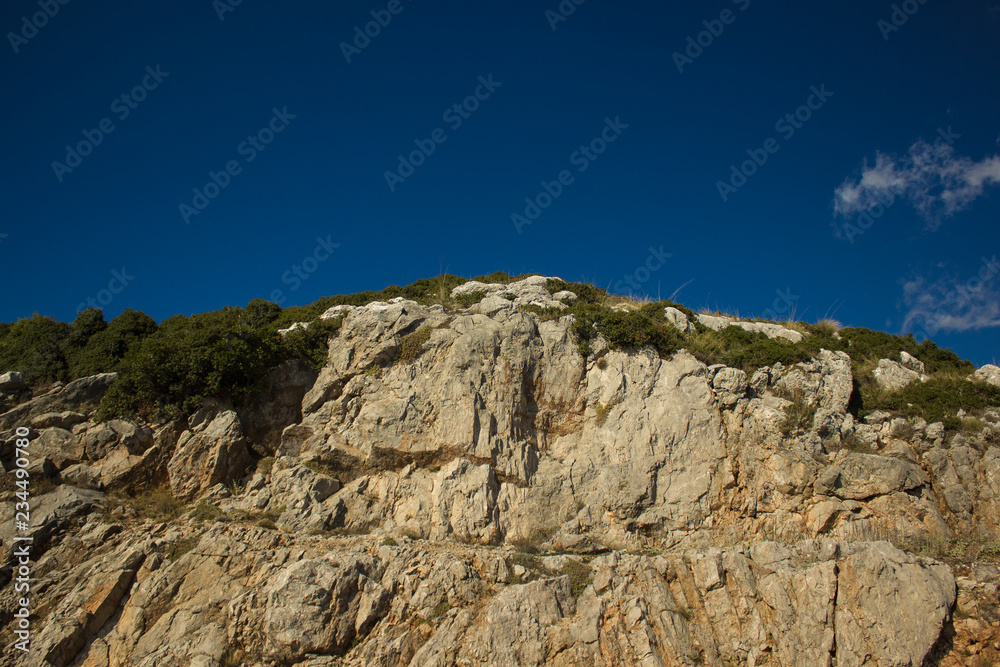 picturesque mountain rock nature landscape good place for hiking on vivid blue sky background
