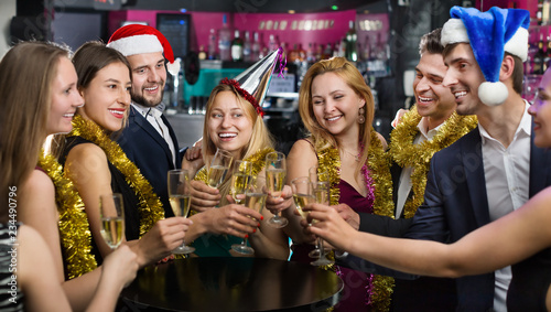 Young friends dancing on new year party