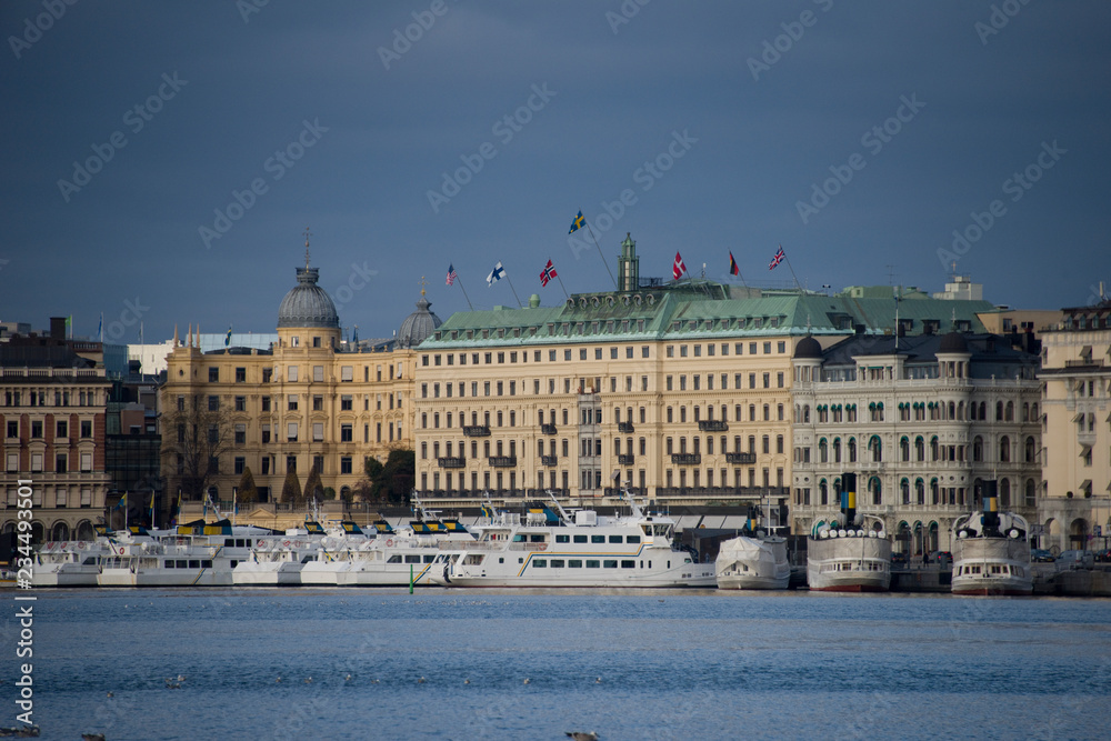 Obraz premium Commuting boats and Old steamboats at Blasieholmen island in stockholm