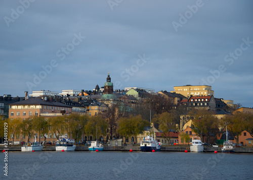 Houses, Pier and Boats on Kungsholmen island in Stockholm photo