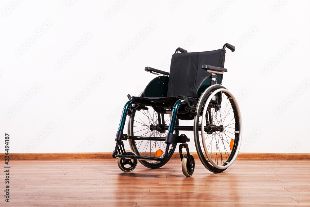 A wheelchair on a white background. Copy space.