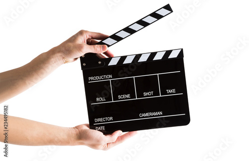 Man hands holding movie production clapper board isolated on white background photo