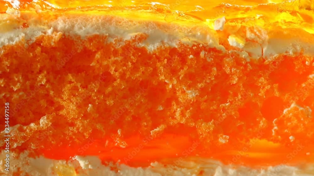 Orange cake on turn table, close up
Orange cake on turn table, close up
