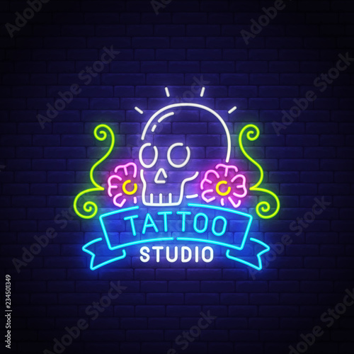 Tattoo studio neon text, bright signboard, light banner. Skull neon logo, emblem. Tattoo sign. Vector illustration