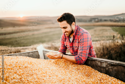 Portrait of harvest details - Farmer enjoying harvest and smiling