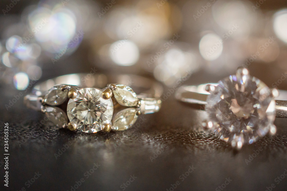 Jewelry diamond rings set on black background close up