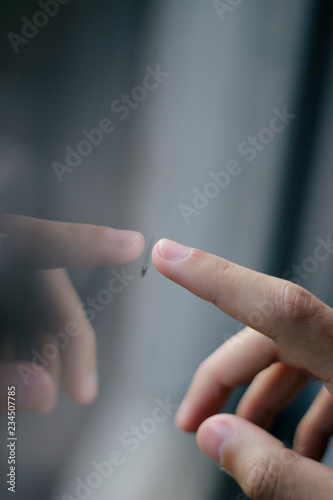 hand touching glass