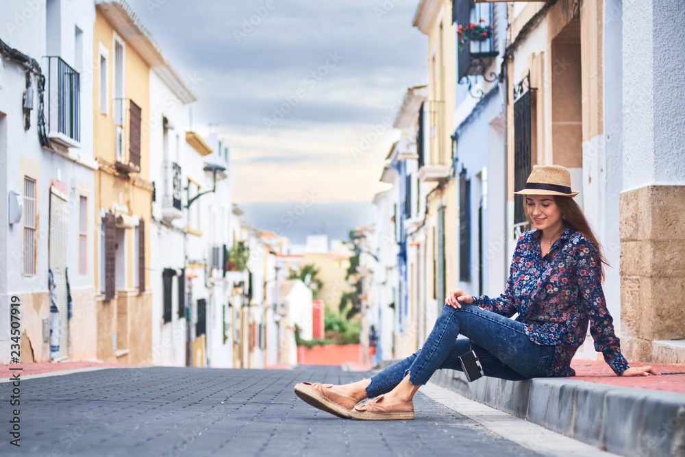 Young woman enjoying her vacations in Spain