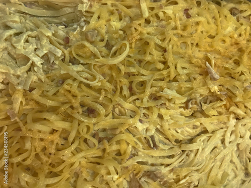 spaghetti carbonara on big plate at hotel ready to serve