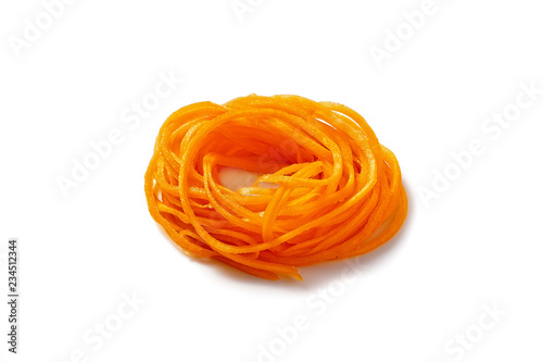 pumpkin vegetable noodles. spiralized butternut squash. isolated on white background.