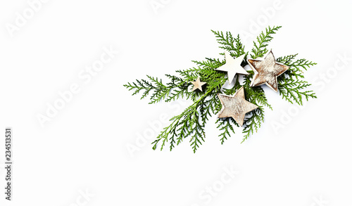 Фотография An arrangement of evergreen twigs and Christmas decorations