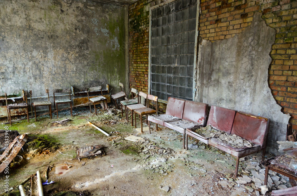 Hall in hospital No. 126, abandoned ghost town Pripyat in exclusion zone of Chernobyl nuclear power plant, Ukraine