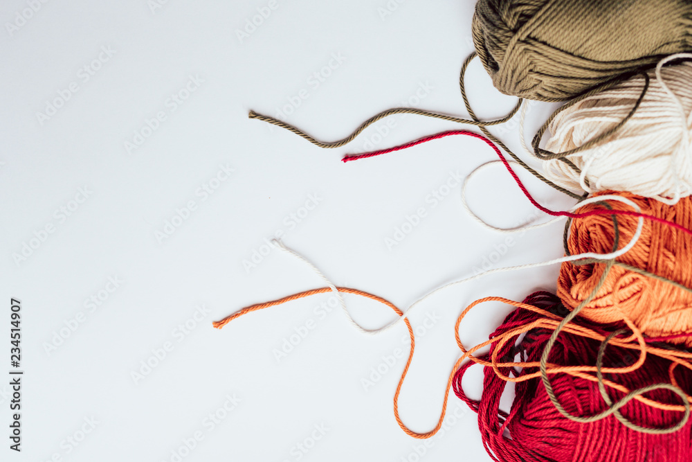 Colorful Yarn Laying on a Table Colorful Yarn Laying on a Table