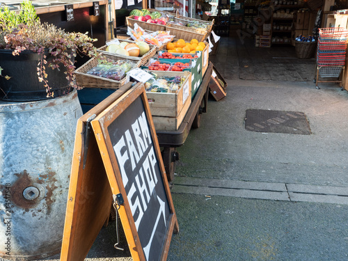 Wallpaper Mural Farm Shop sign with produce outside, at Looe in Cornwall. Torontodigital.ca