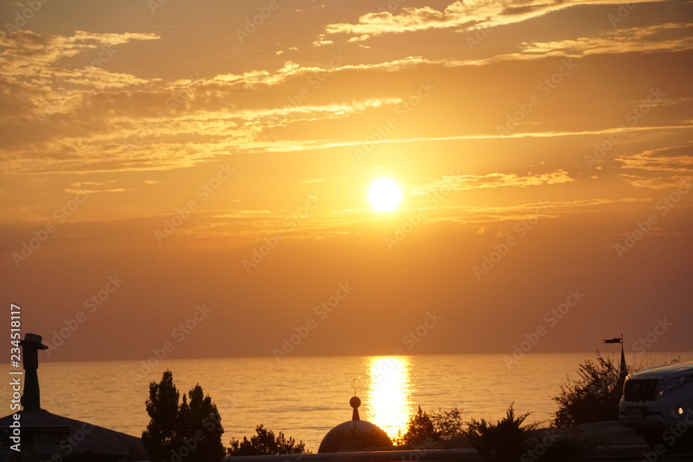 the sunset at the Caspian sea the city off Aktau Kazakhstan