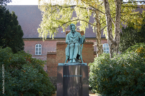 Copenhagen, Denmark - October 10, 2018:View of Søren Kierkegaard sculpture in the Biblioteks Have photo