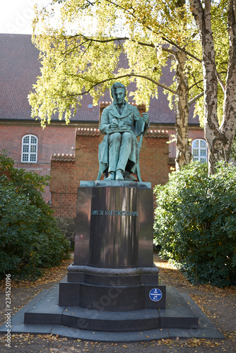 Copenhagen, Denmark - October 10, 2018:View of Søren Kierkegaard sculpture in the Biblioteks Have photo