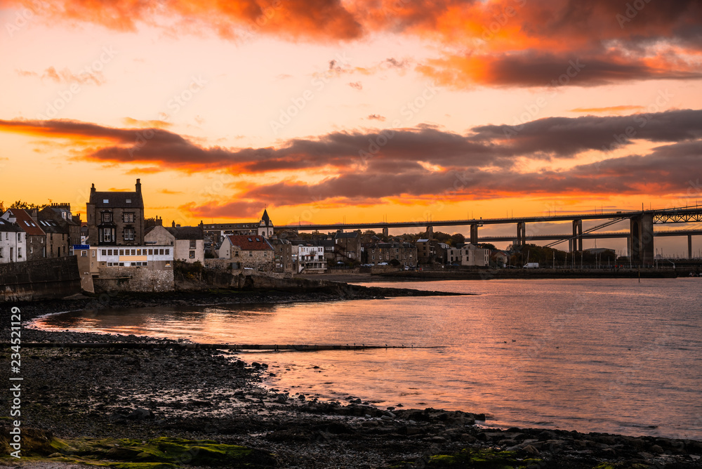 Beautiful Orange Sunset over South Queensferry on the Shore of Firth of Forth, Scotland, UK