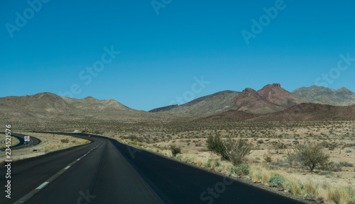 Arizona desert blacktop road in the mountains