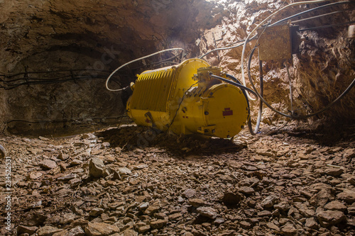 Underground gold iron ore mine shaft tunnel gallery passage with transformer elecrical
