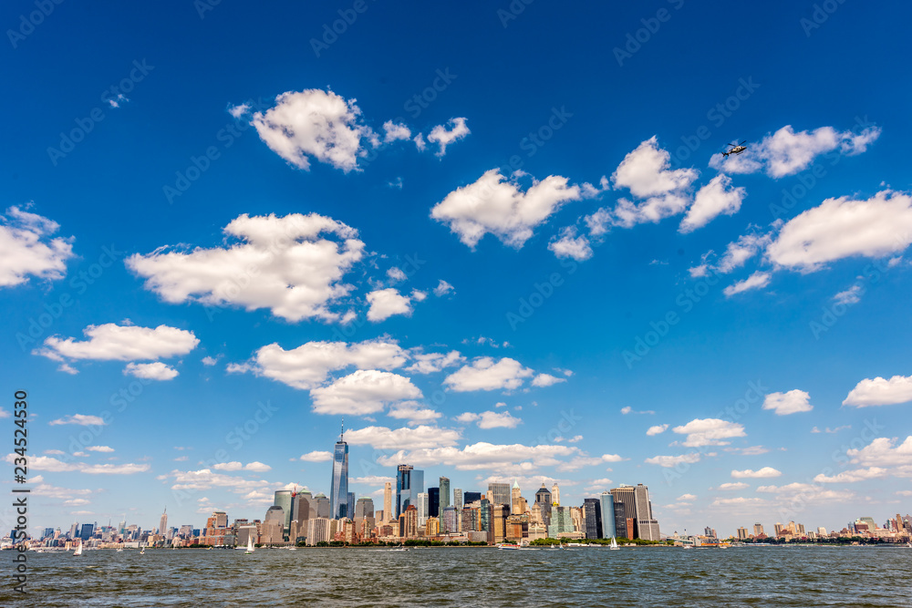 Helicopter Flying Over New York Harbor and Lower Manhattan Helicopter Flying Over New York Harbor and Lower Manhattan