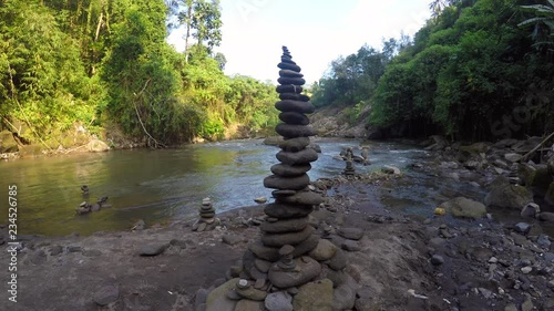 cairn at a waterfall in Indonesia