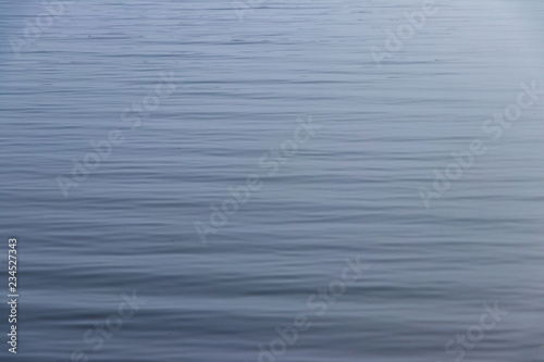 background. blue ripples on the river \ sea