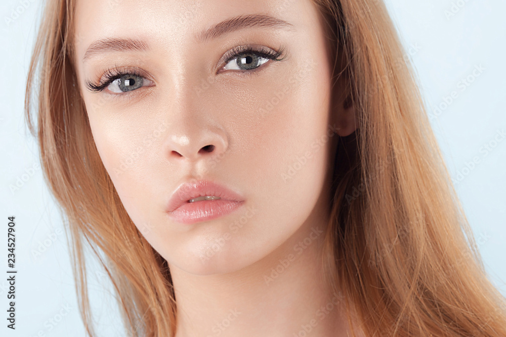 Young beautiful girl with clean perfect skin close-up Young beautiful girl with clean perfect skin close-up