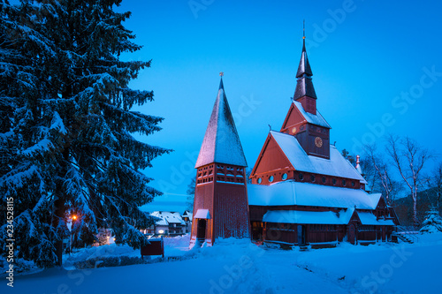 Stabkirche im Harz am Abend im Winter photo