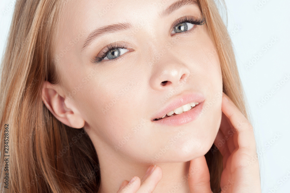 Young beautiful girl with clean perfect skin close-up Young beautiful girl with clean perfect skin close-up