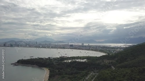 2K Aerial top view of beautiful panorama and sea view in Da Nang city Vietnam at Linh Ung Pagoda at sunset.  photo