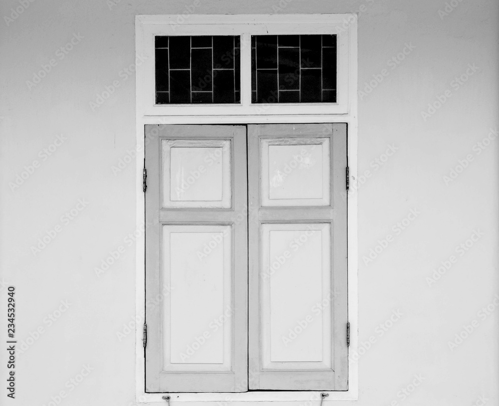 antique wood window at old concrete building - monochrome antique wood window at old concrete building - monochrome