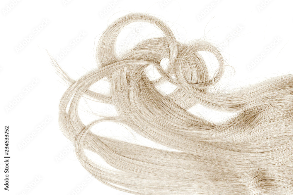 A strands of long, twisted, blond hair isolated on white background A strands of long, twisted, blond hair isolated on white background