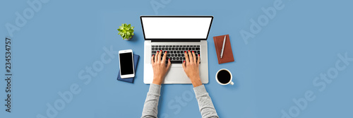 Woman working on laptop. Close up