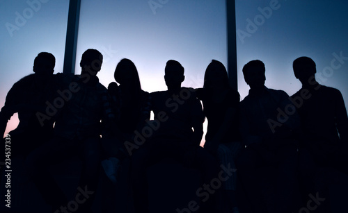 creative young people on the background of a large window