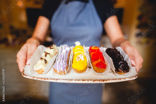 the chef cooked delicious  eclair on the tray