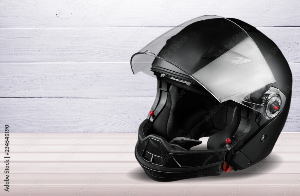 Fototapeta premium Black biker helmet isolated on white background