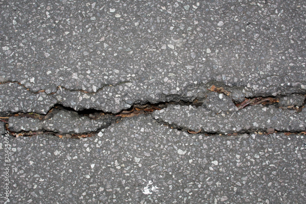 Obraz premium a crack in the asphalt