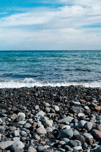 pebble stone beach , ocean horizon