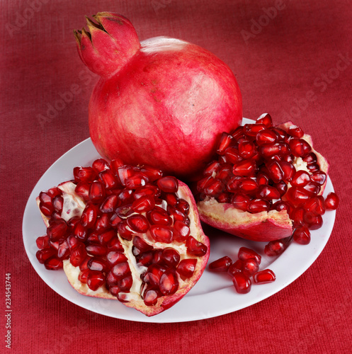 POMEGRANATES ON PLATE photo