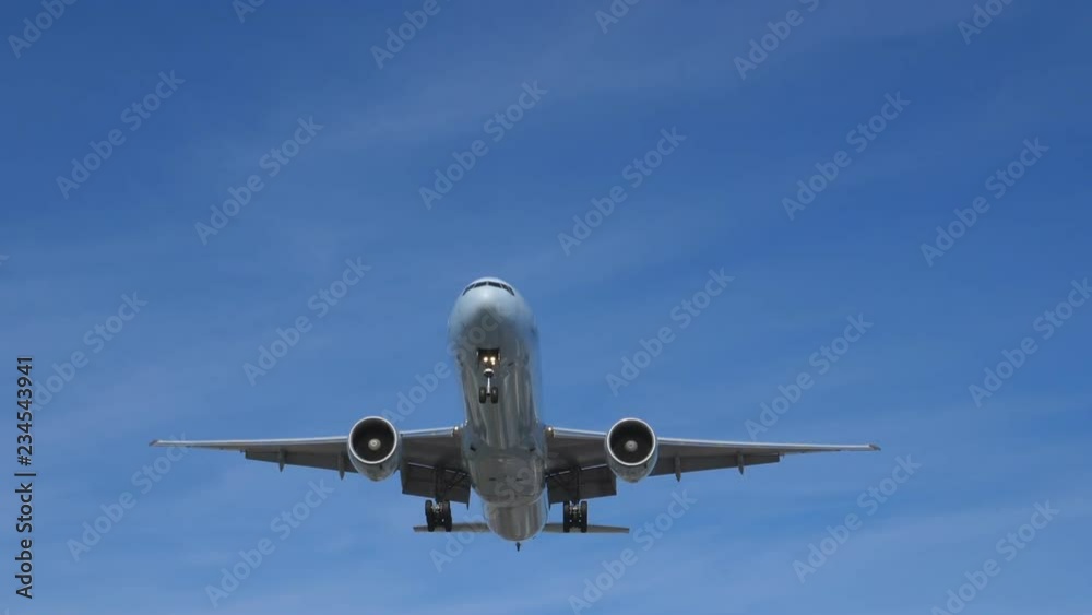 Slow motion. Commercial jet coming into land . Boeing 777-233 (LR) landing at YYZ in Toronto. No visible logos. Room for copy. Slow motion. Commercial jet coming into land . Boeing 777-233 (LR) landing at YYZ in Toronto. No visible logos. Room for copy.