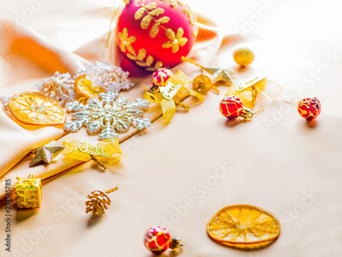 Christmas decor on a light textile background with space for text