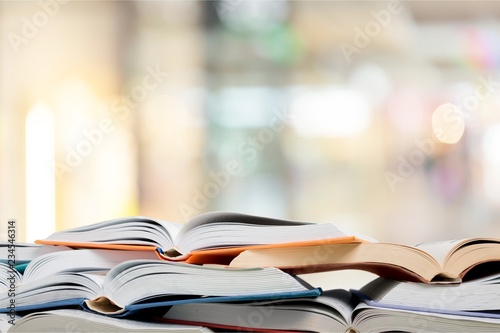 Stack of books isolated on  background. © BillionPhotos.com