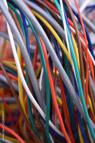 Closeup of electric cable and wire in computer network systems with selective focus