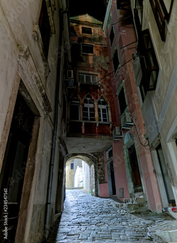 Street in Piran (Slovenia) by night. the old town has numerous passageways and overhangs