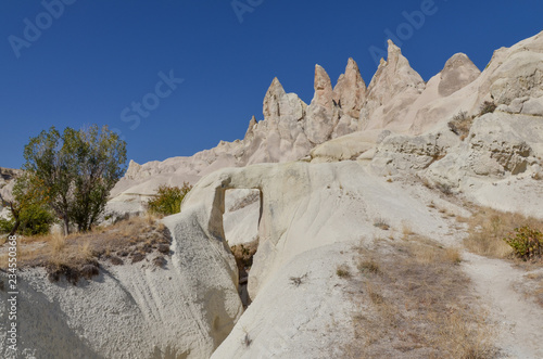 sandstone hoodoos and rocks in Love Valley (Baglidere Vadisi)  Goreme, Nevsehir province, Turkey photo